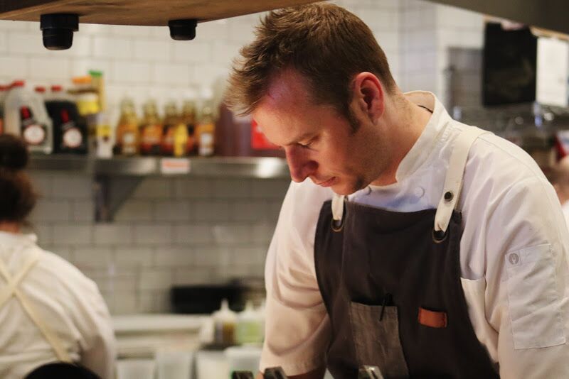Chris Hartman at work in the kitchen