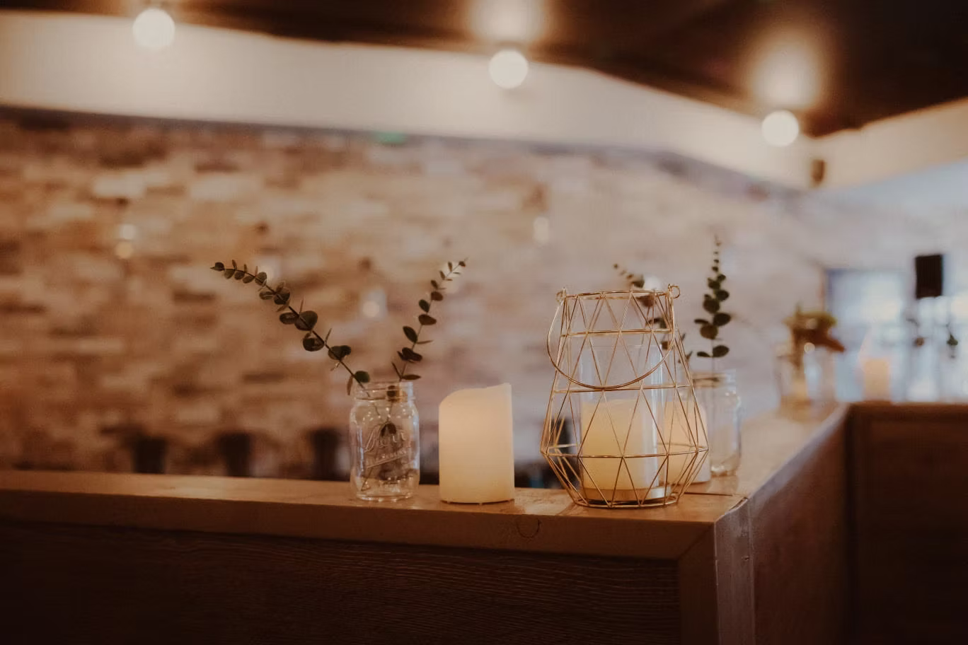 A candlelit table ready for dinner at Fence & Post
